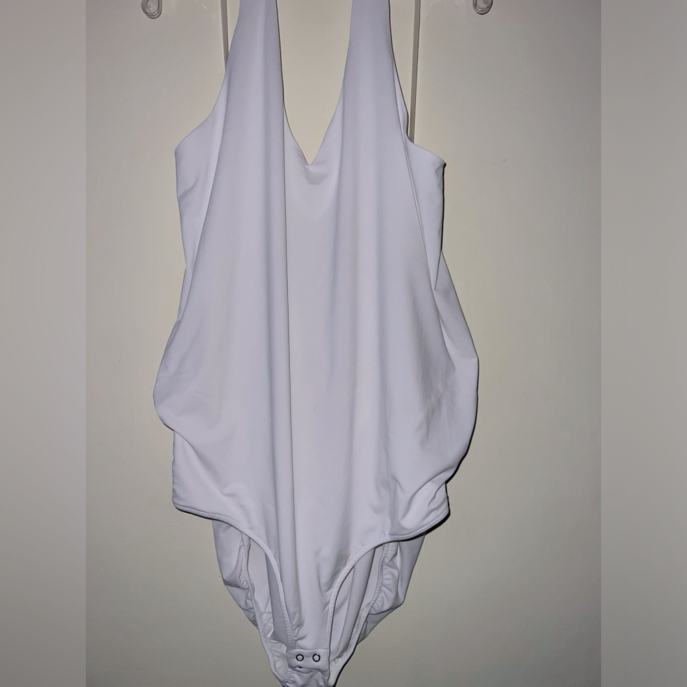 White, halter top Lane Bryant body suit.